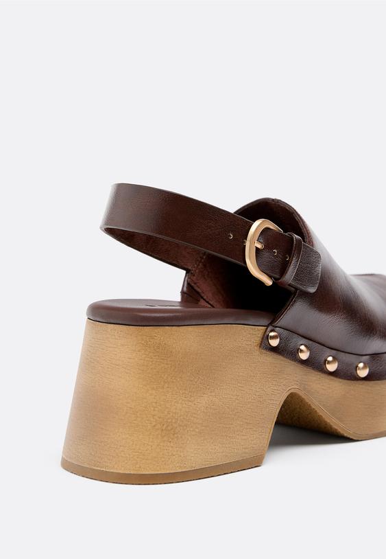 zoccoli con plateau e borchie