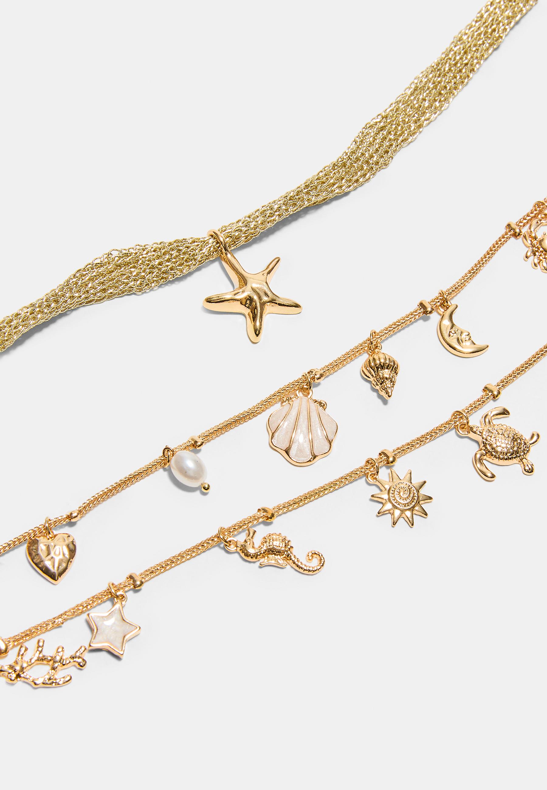 Set of 2 marine charm necklaces — Gold