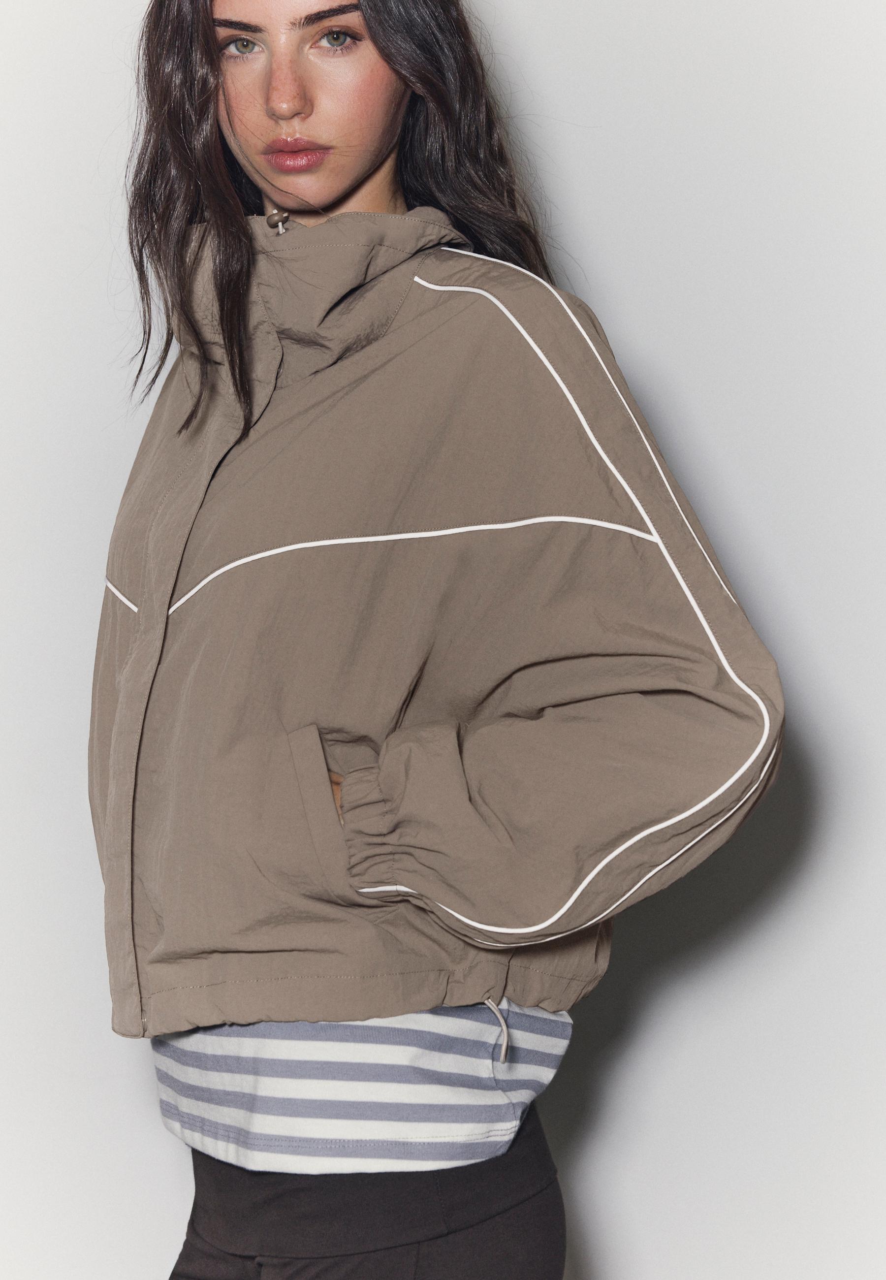 Technical windbreaker — Brown