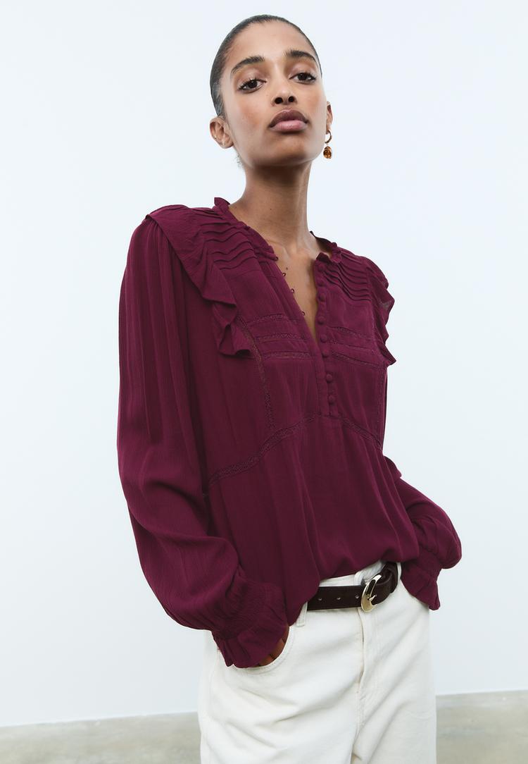 blusa con volant e bottoni