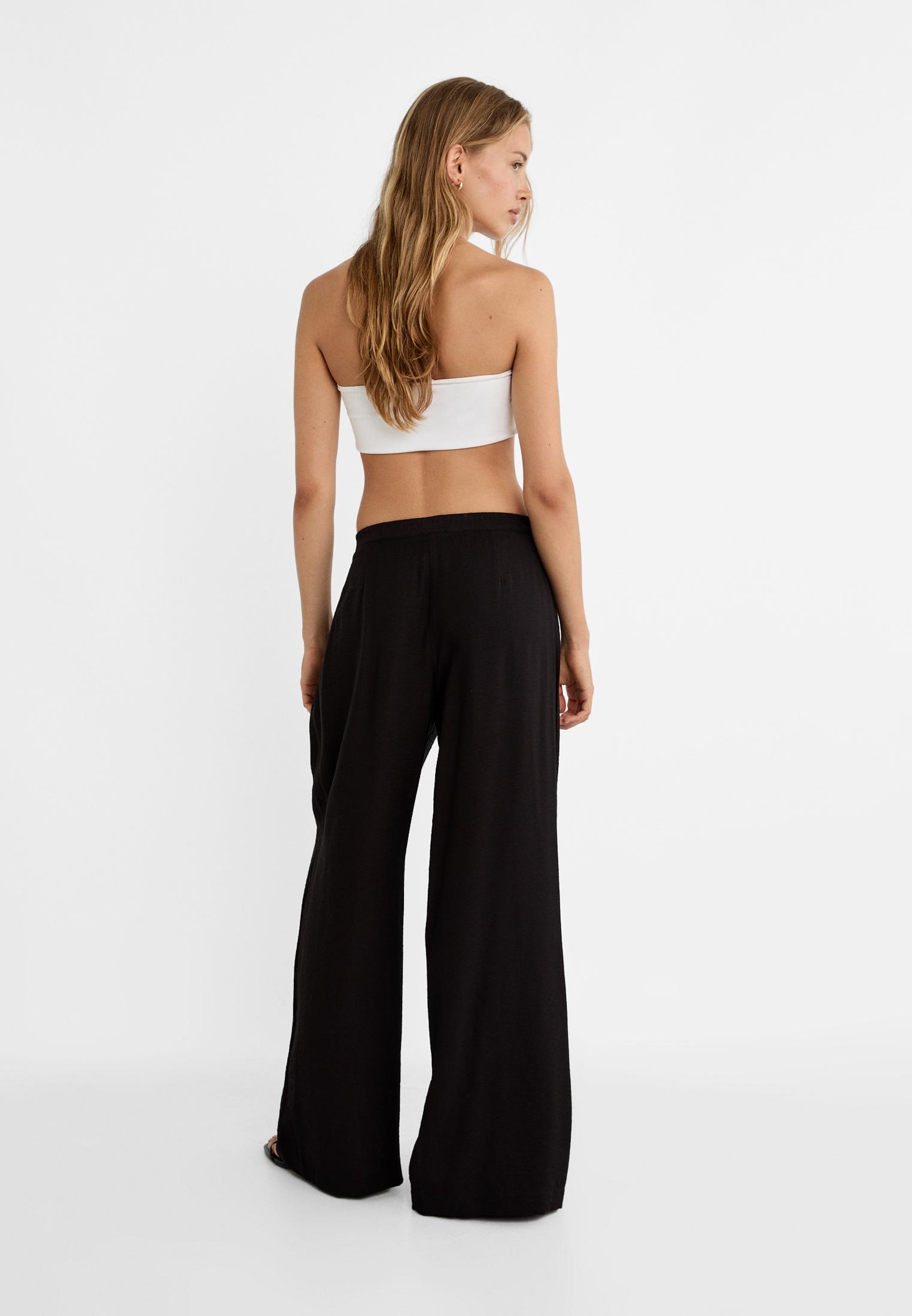 Pantalon fluido palazzo textura