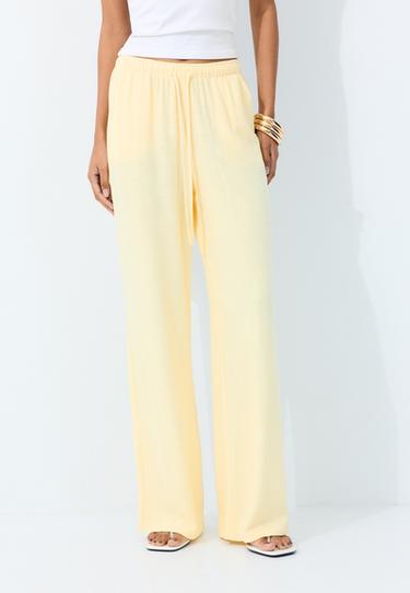Flowing linen-effect trousers — Pastel yellow 3