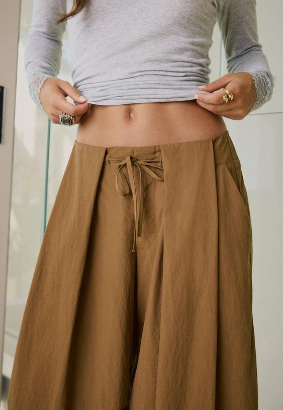 pantalon technique a plis