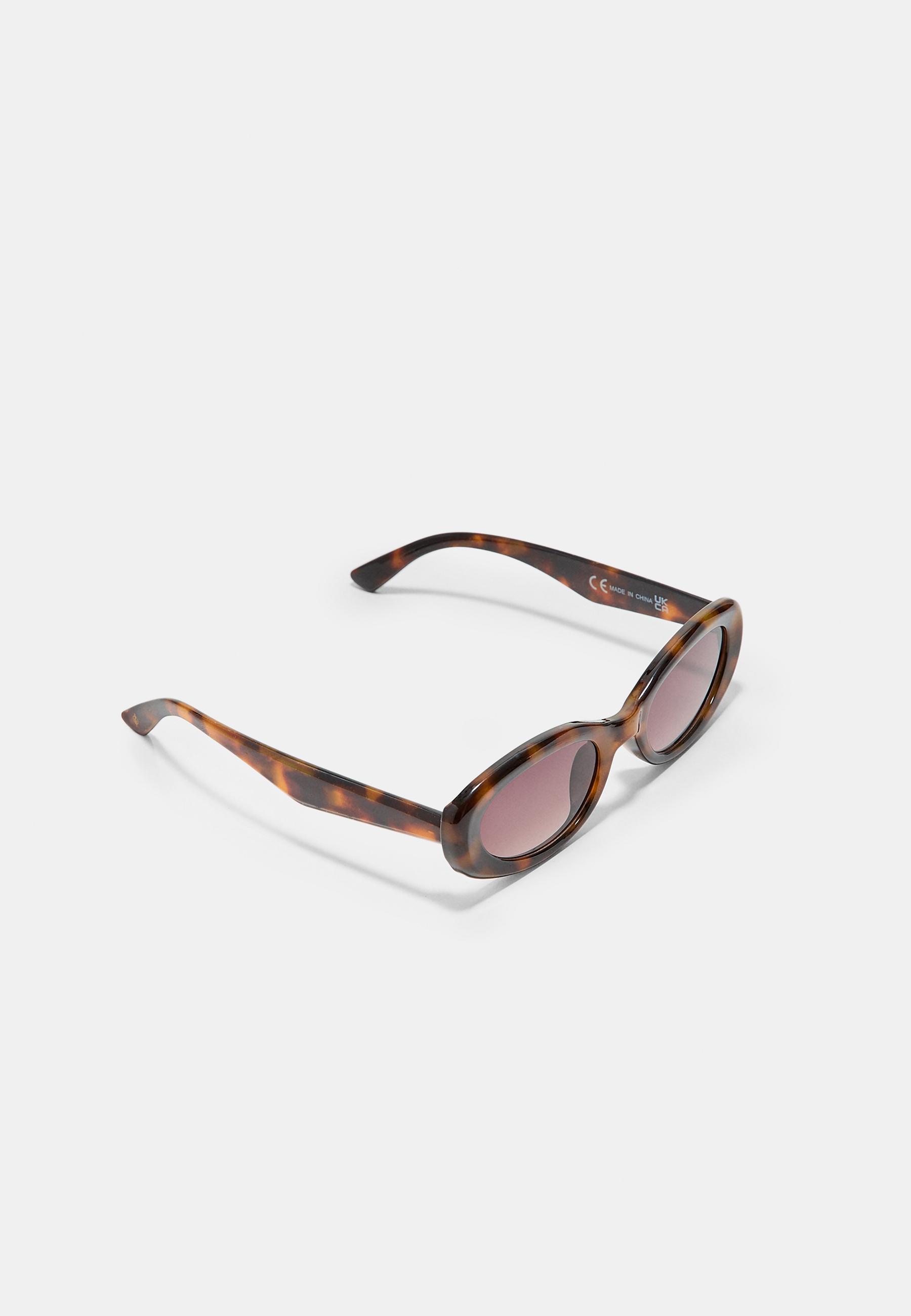 Oval tortoiseshell sunglasses — Brown