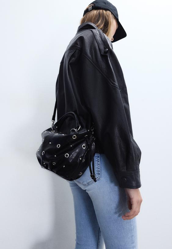 bolso bombonera detalle eyelets