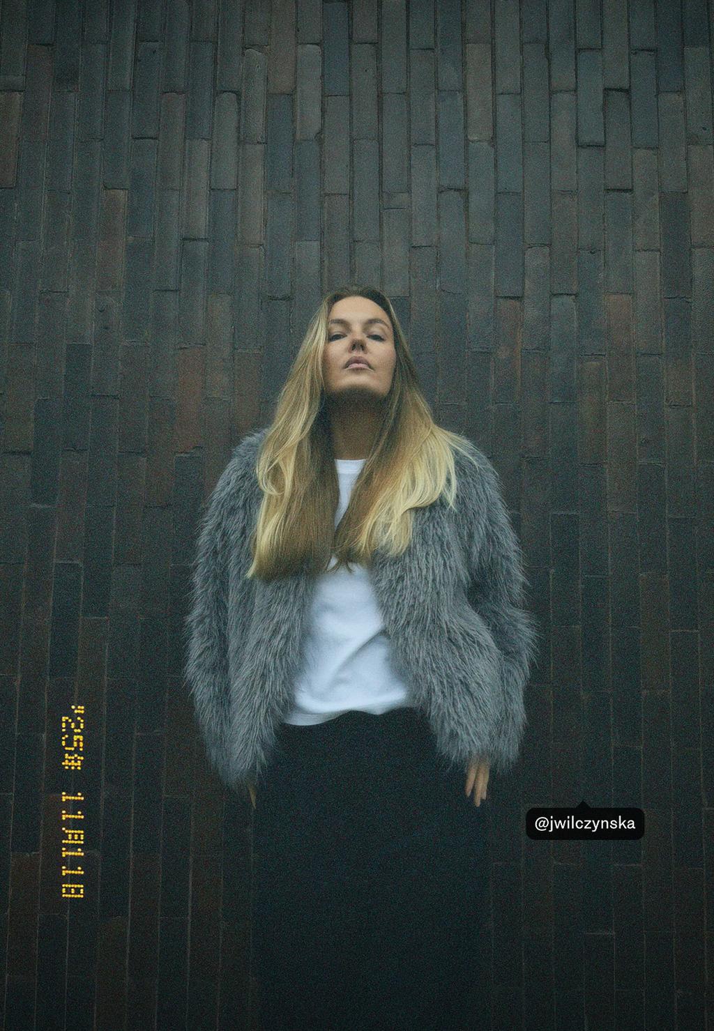 Collarless faux fur jacket