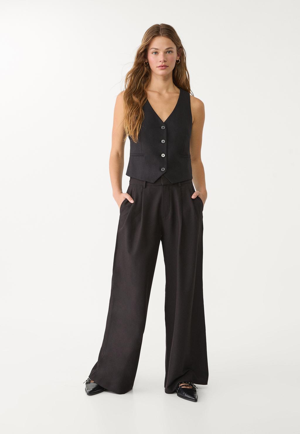 Gilet court boutons