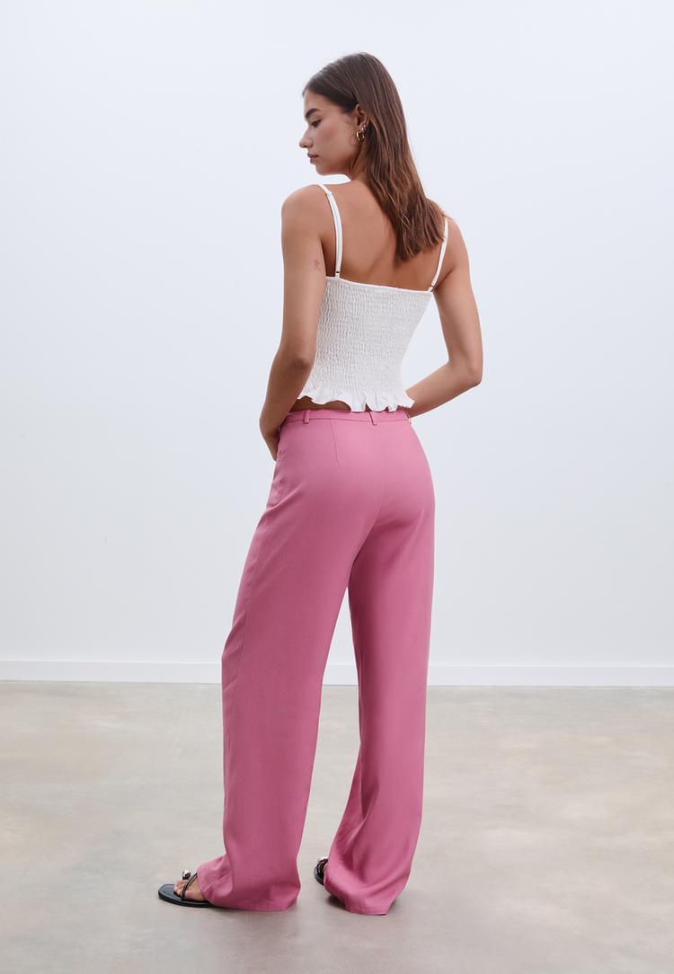 pantalon fluido bolsillos