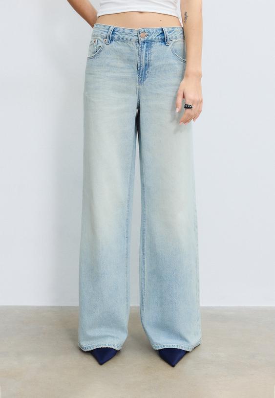 D91 Kavbojke Z Nizkim Pasom In Širokimi Hlačnicami