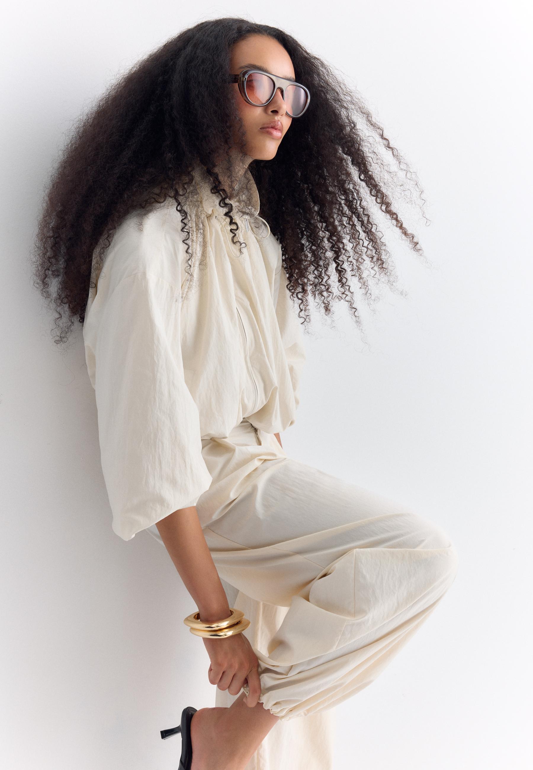 Darted technical sarouel trousers — Ecru