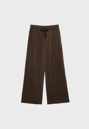 Soft-touch wide-leg jogger trousers with pin tuck — Brown 7