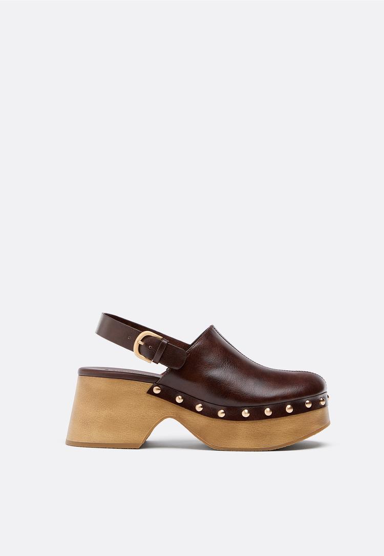 zoccoli con plateau e borchie