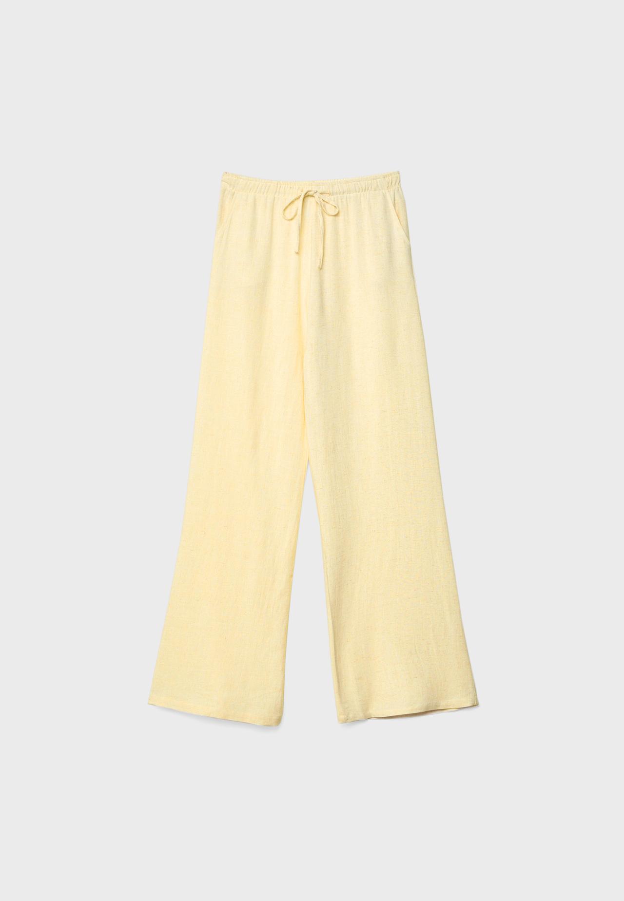Flowing linen-effect trousers — Pastel yellow