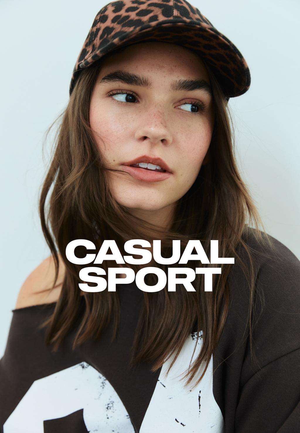 Basic sweatshirt met asymmetrische halslijn