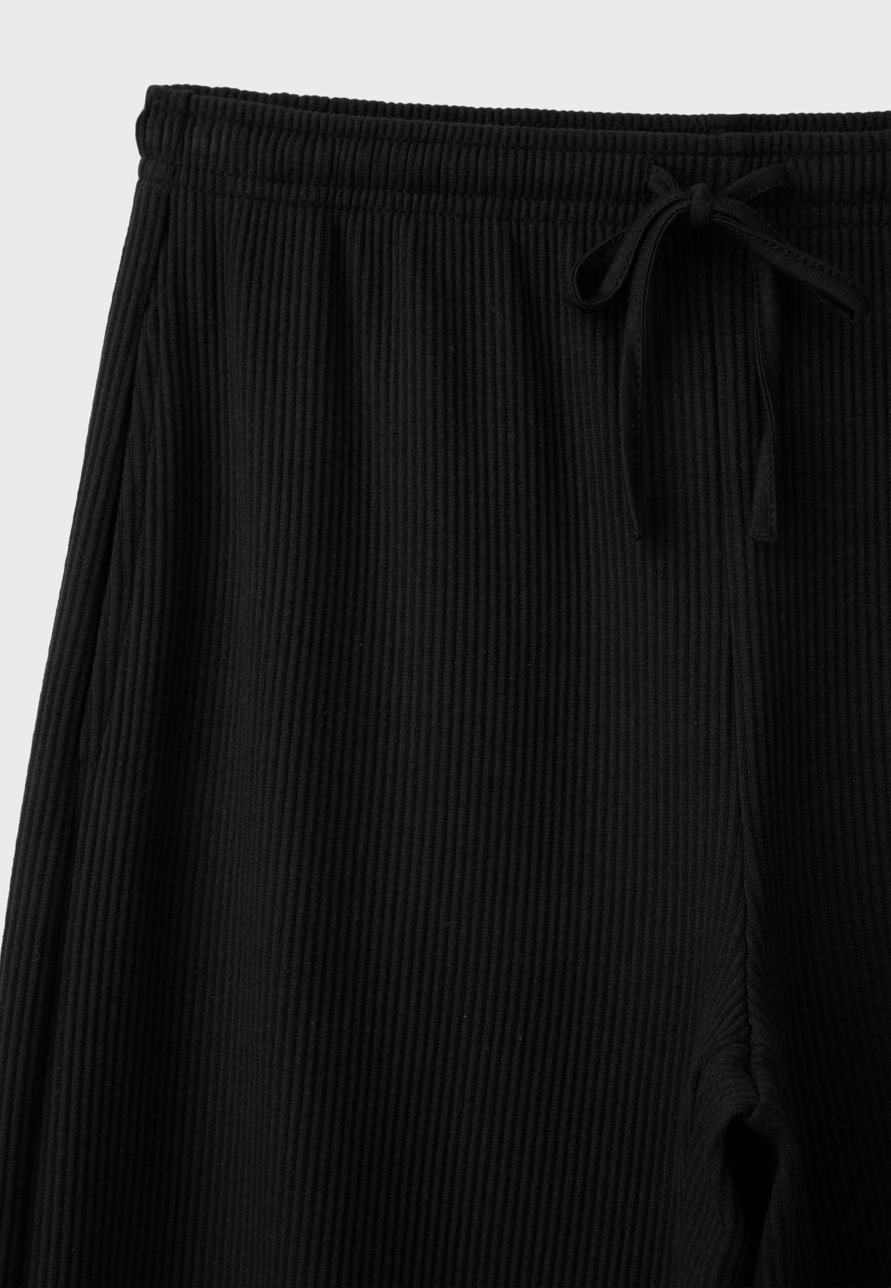 Soft-touch ribbed trousers — Black