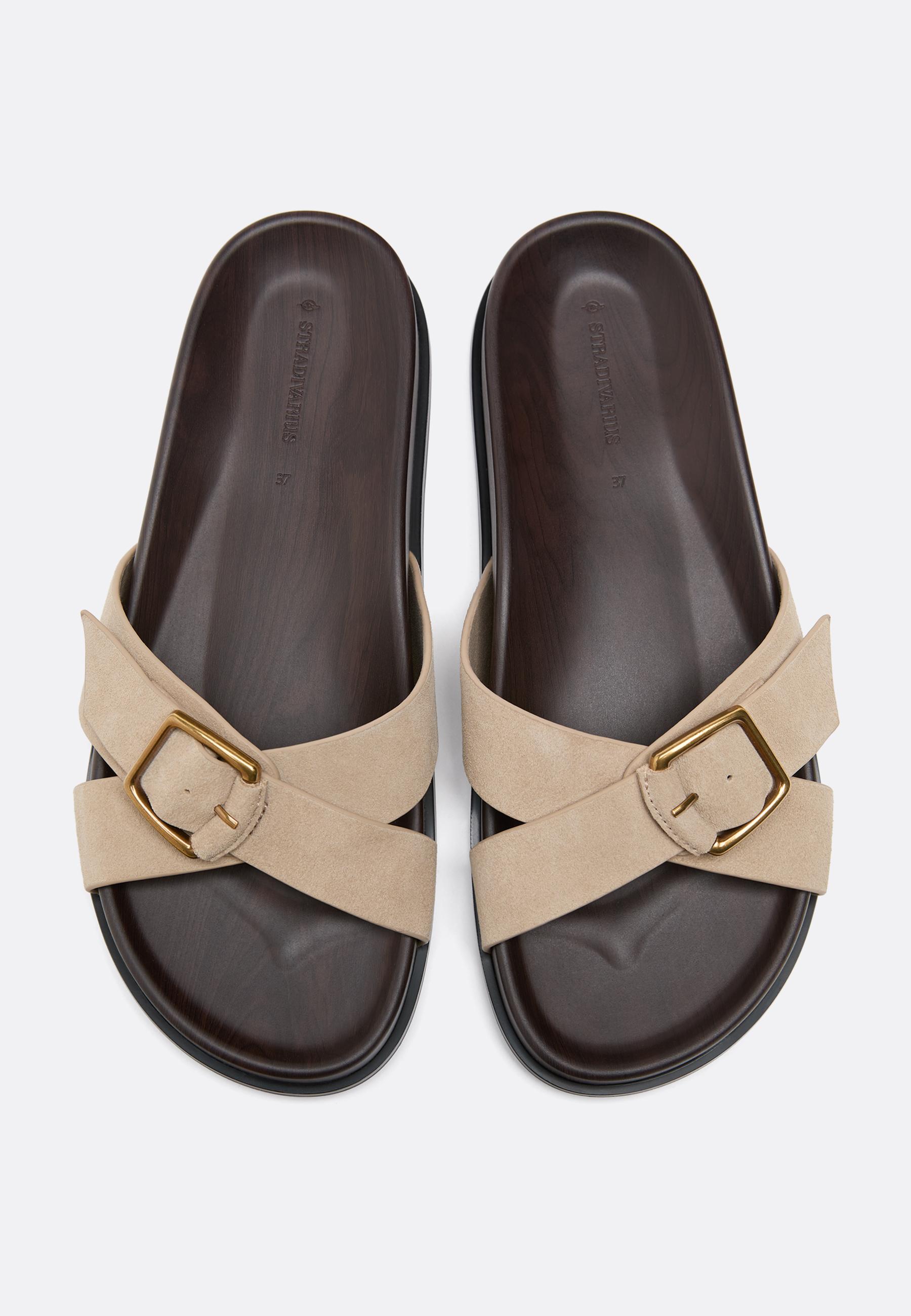 Flat crossed leather sandals — BEIGE