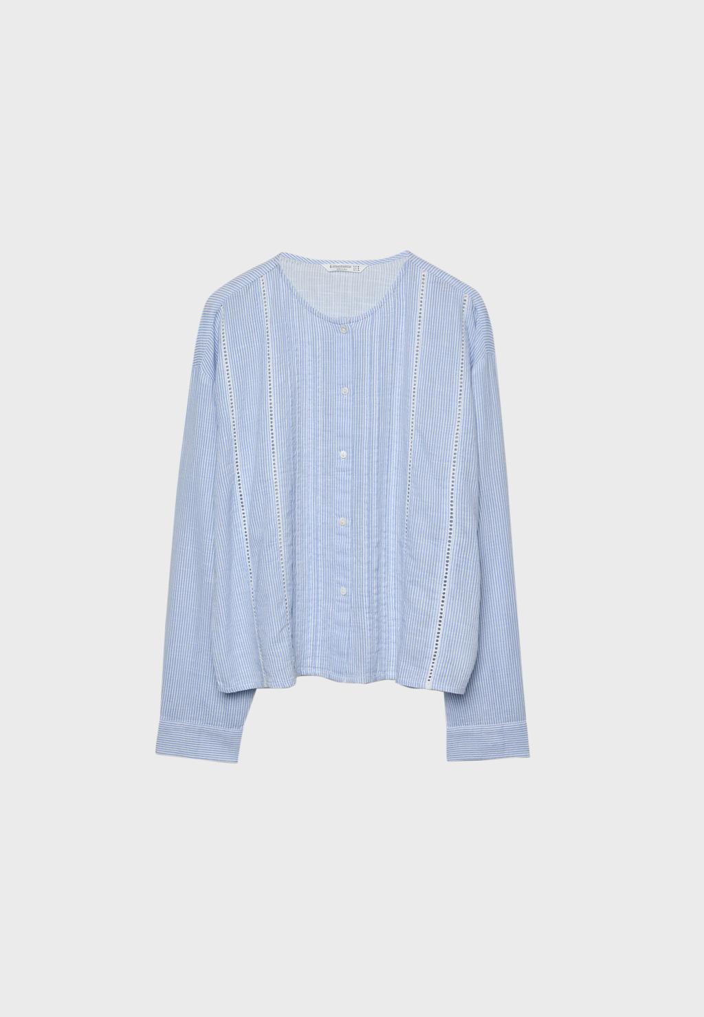 Blusa fluida entredoses