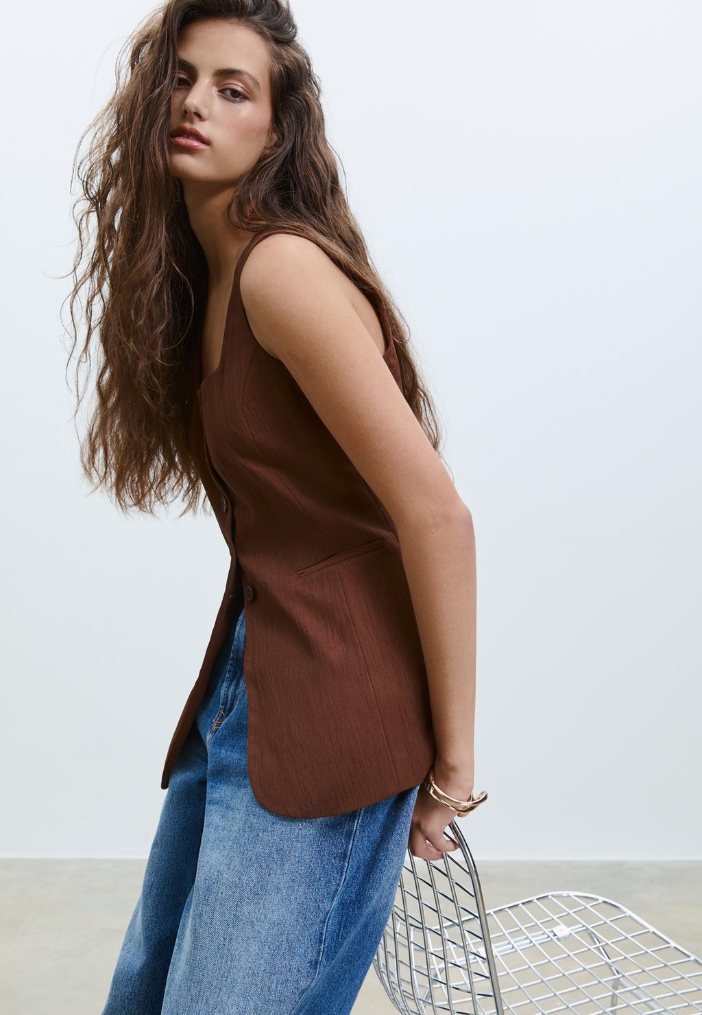 Vloeiend vest met textuur