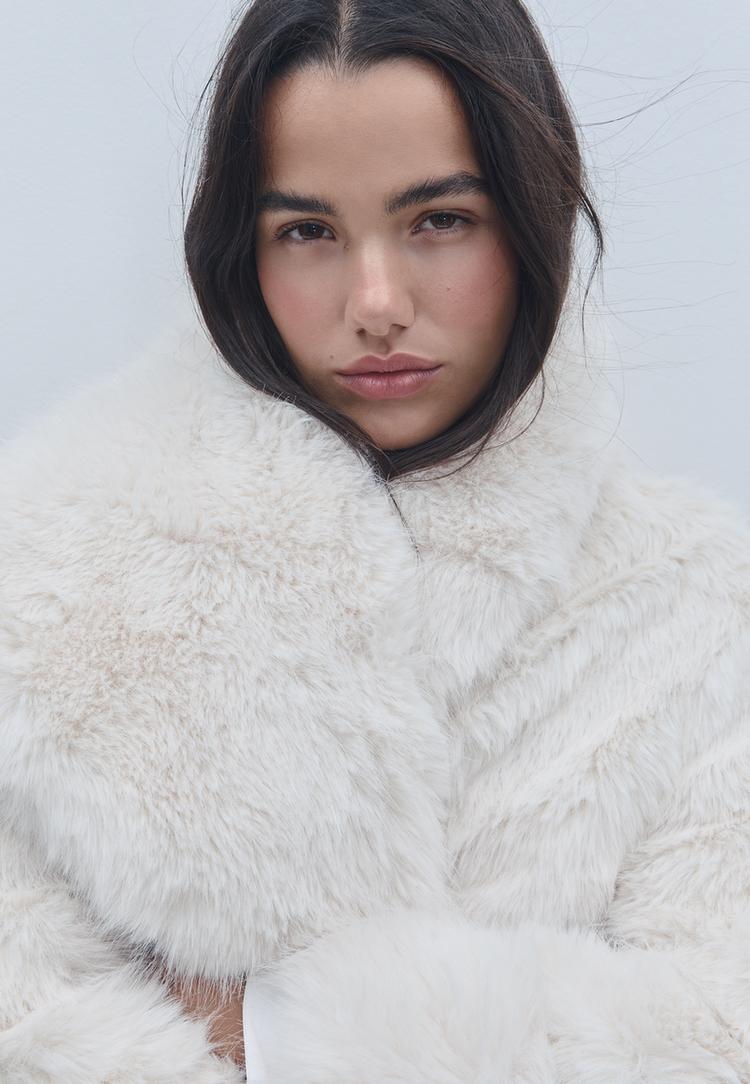 blouson court fausse fourrure