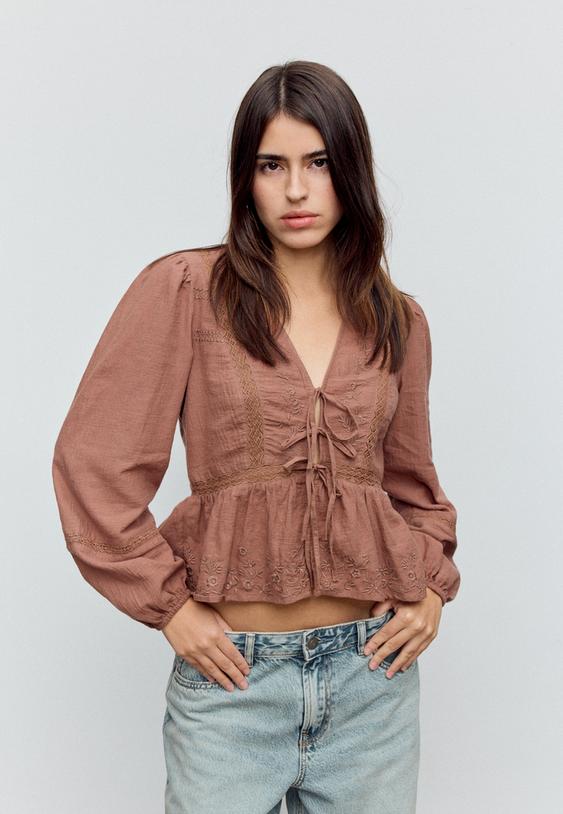 loose fitting embroidered knot blouse