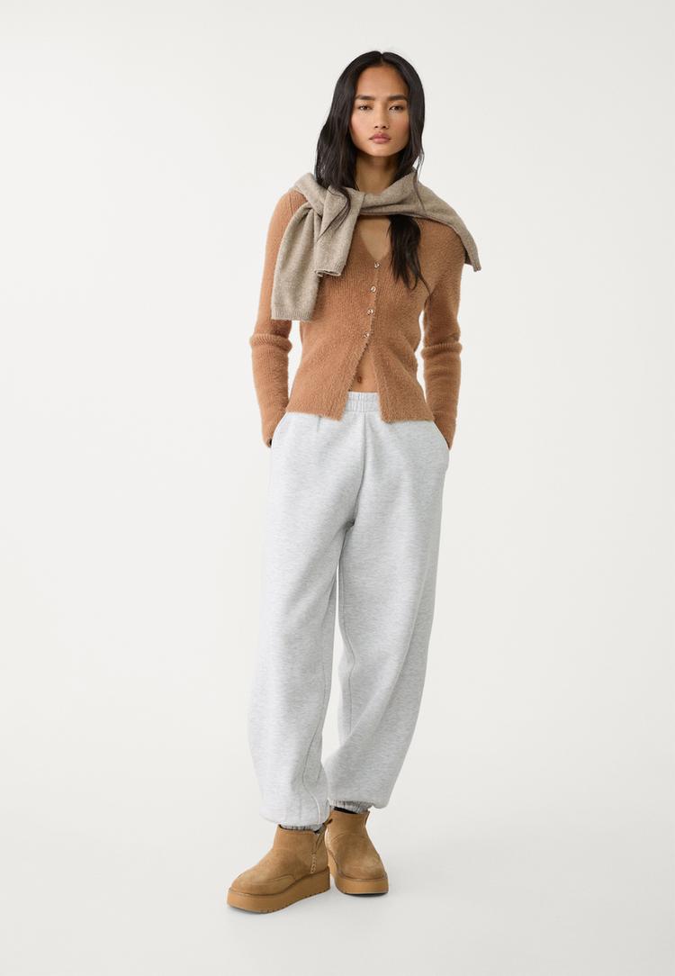 veste avec boutons en fausse fourrure
