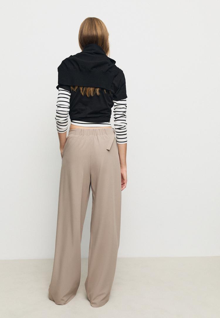 smart wide leg trousers with buckle detail