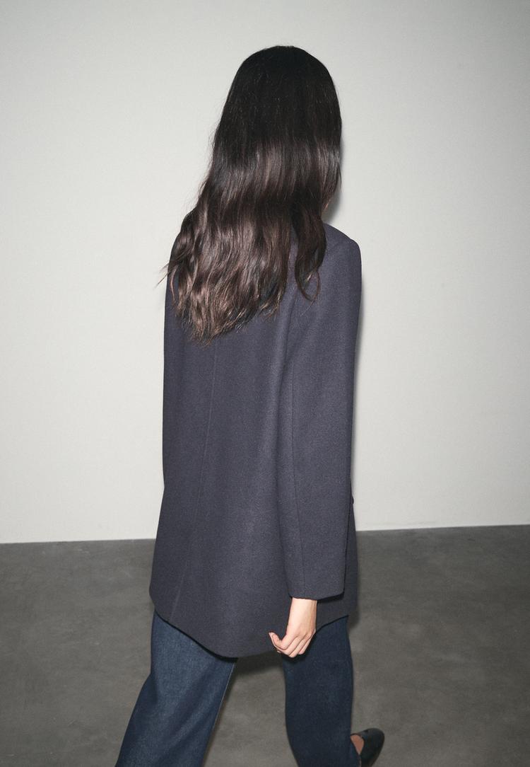 coat with faux fur collar with felt texture