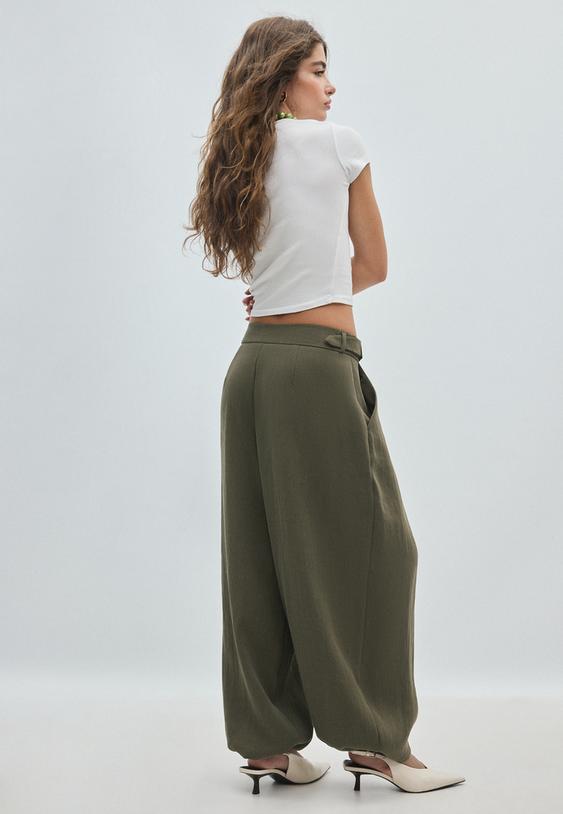 calcas estilo bombachas com fivela