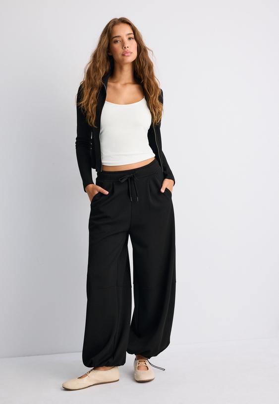 calcas jogger barrel de toque suave com stoppers