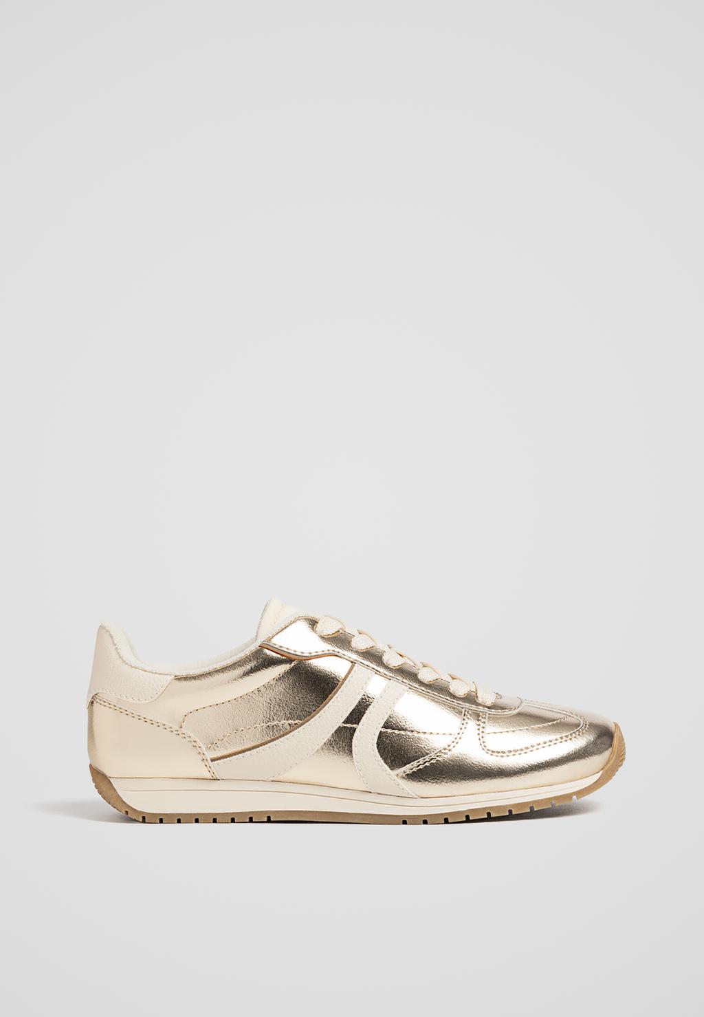 Golden retro trainers