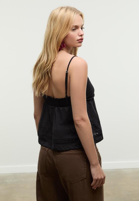 top met schouderbandjes en tussenstukken