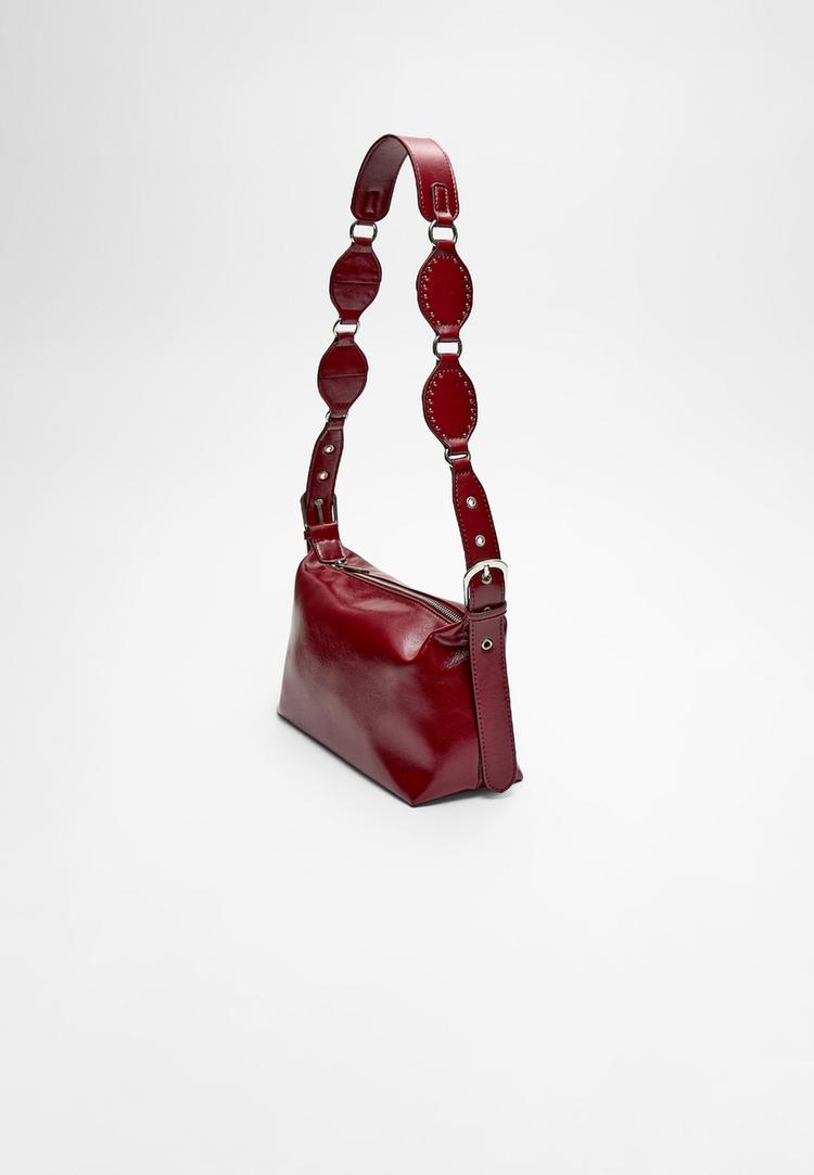 bolso bandolera tachas