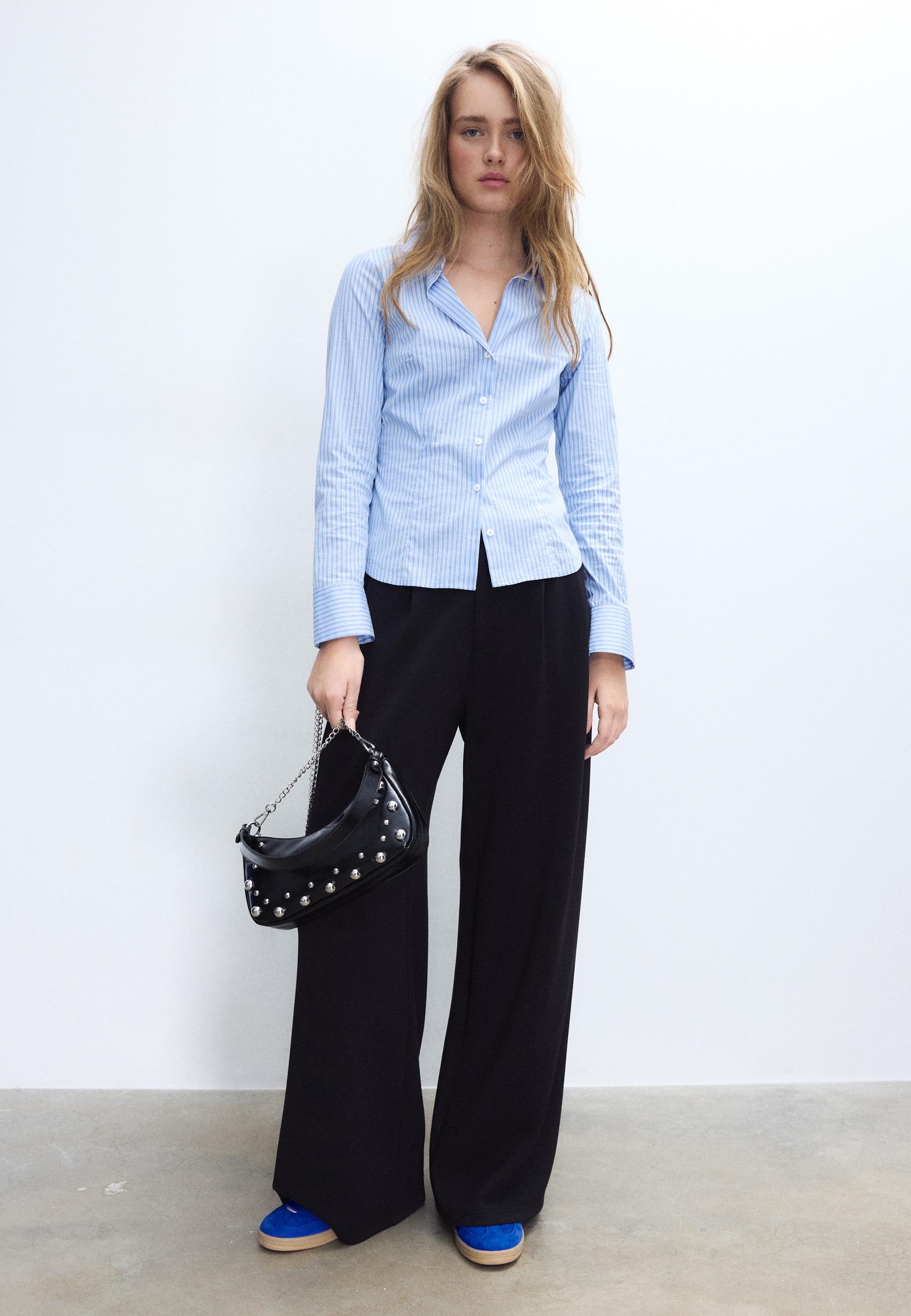 Studded half-moon shoulder bag — Black