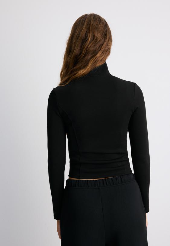 yumusak dokulu fermuarlı vucuda oturan sweatshirt