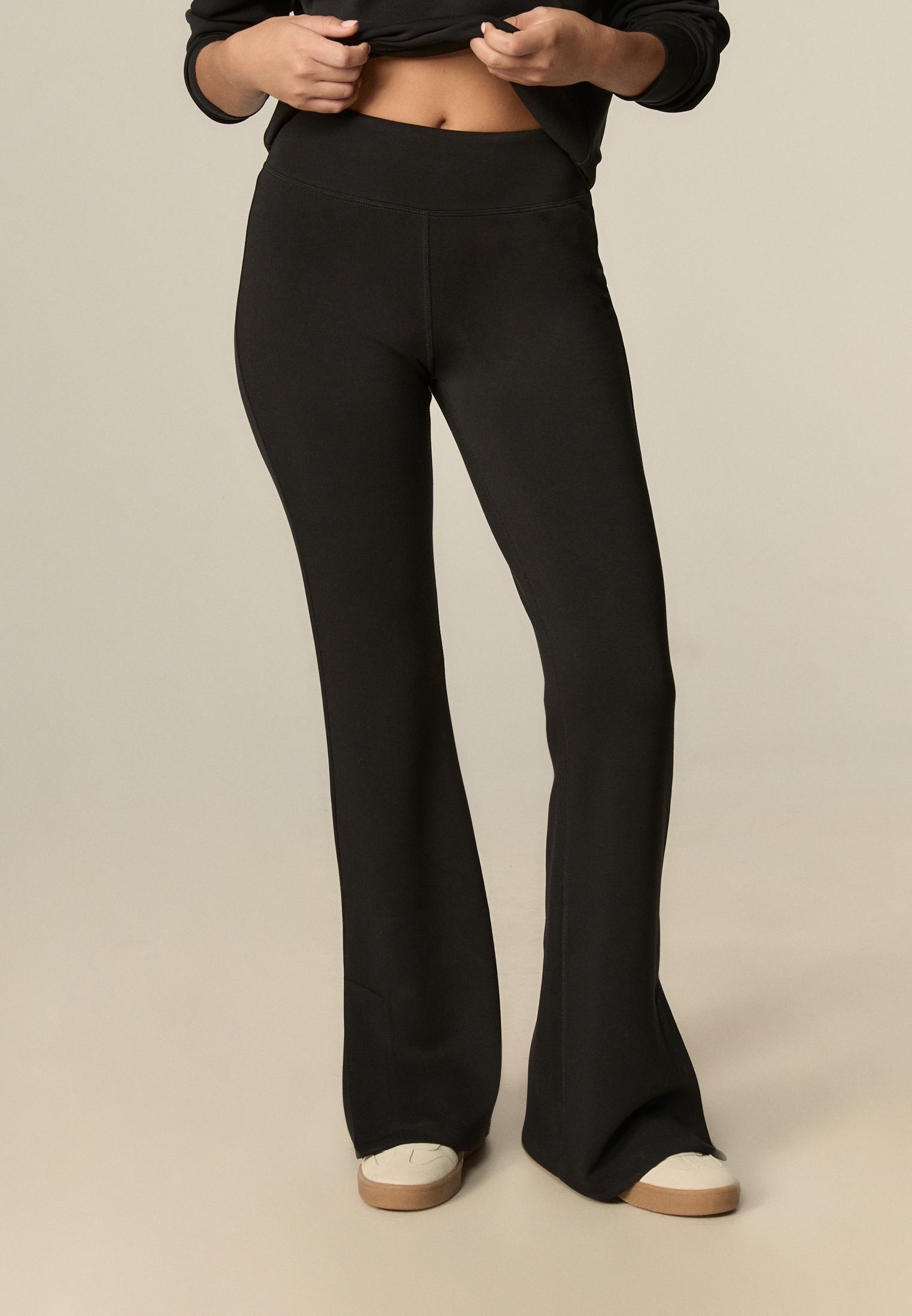Soft-touch bell bottom trousers — Black
