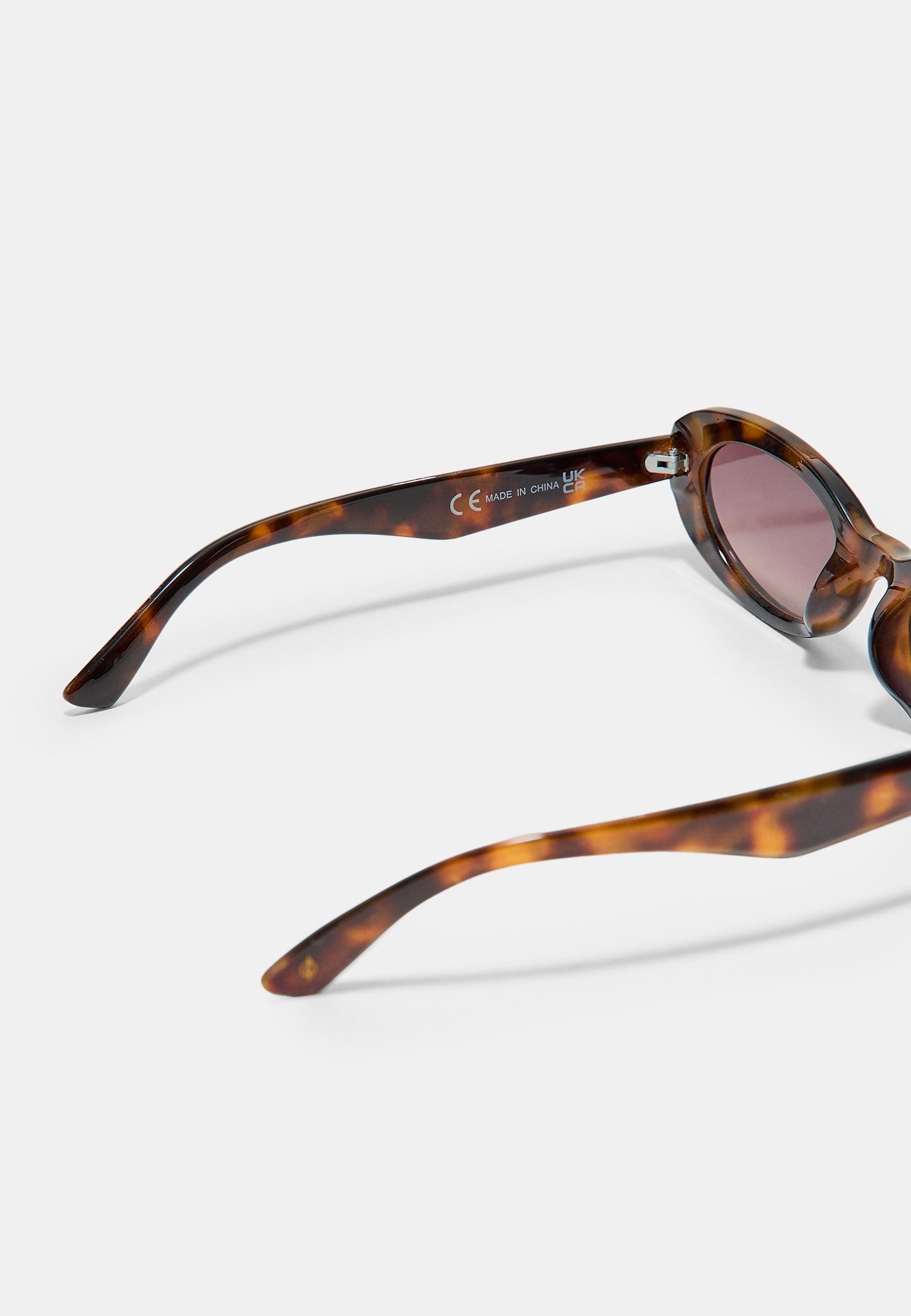 Oval tortoiseshell sunglasses — Brown