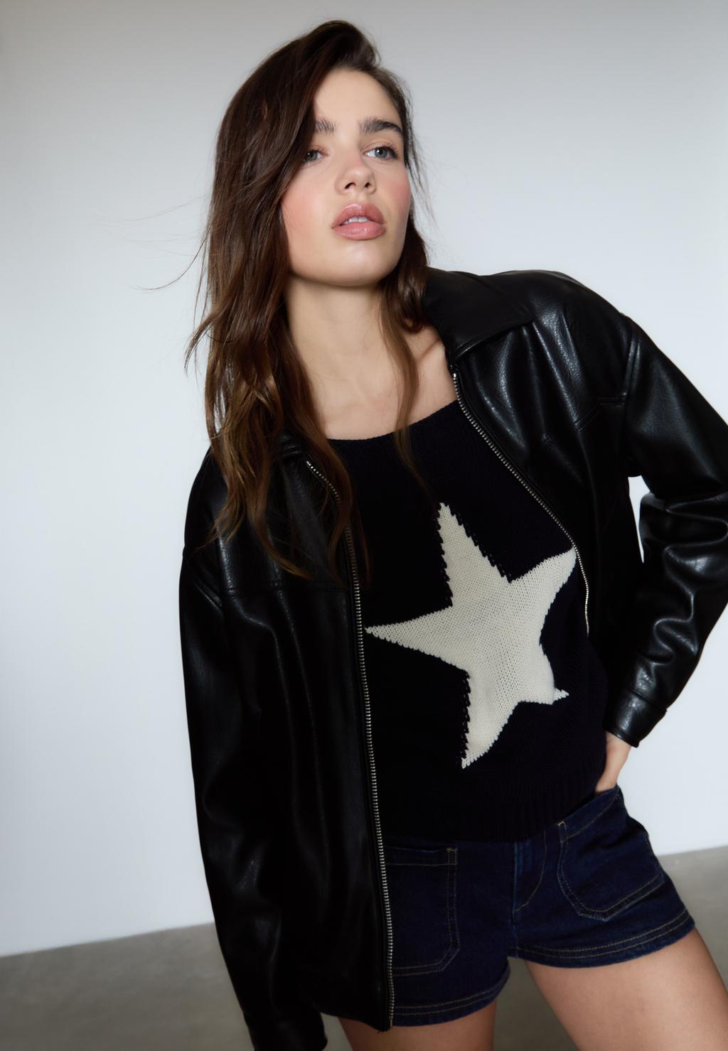 Asymmetric knit sweater with star