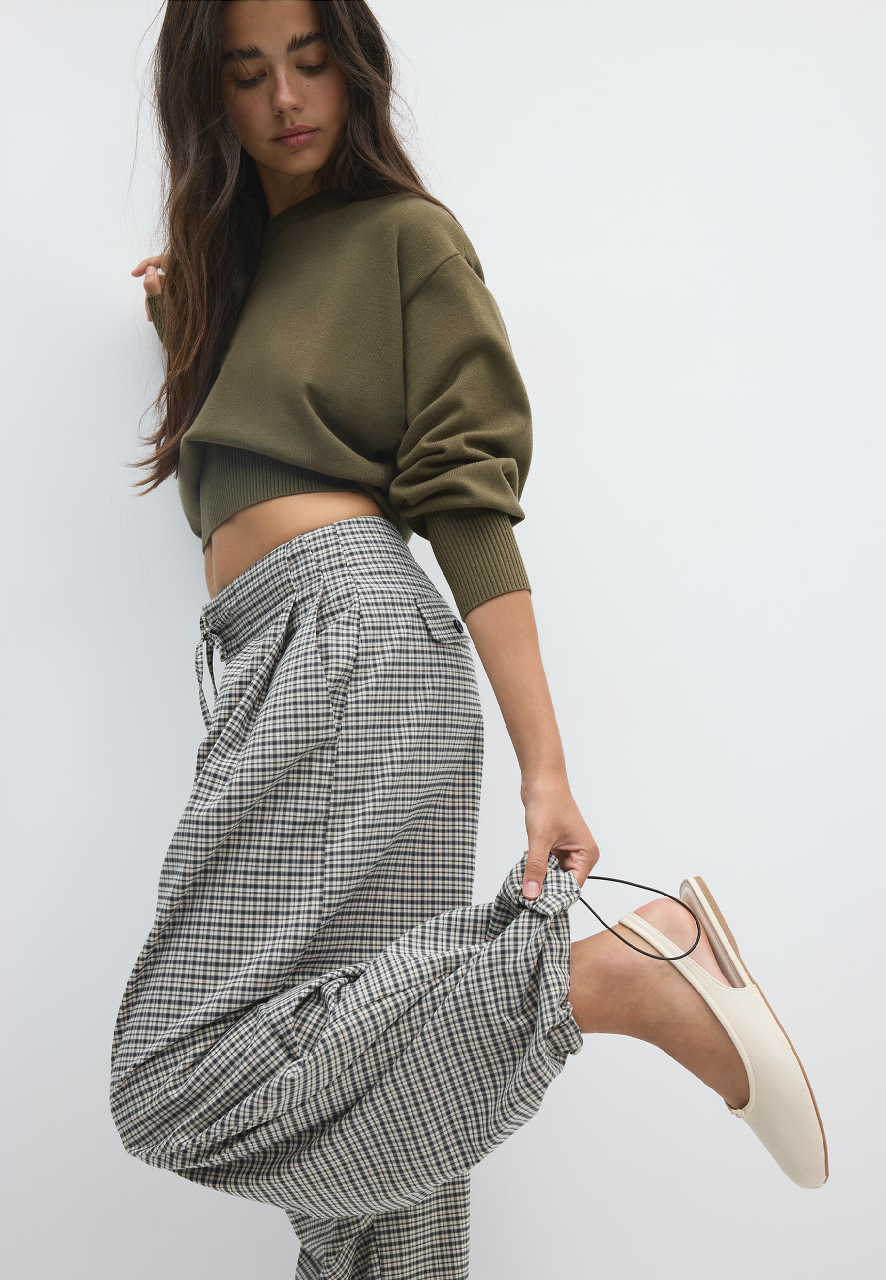 Technical check trousers with pleat detail — Black