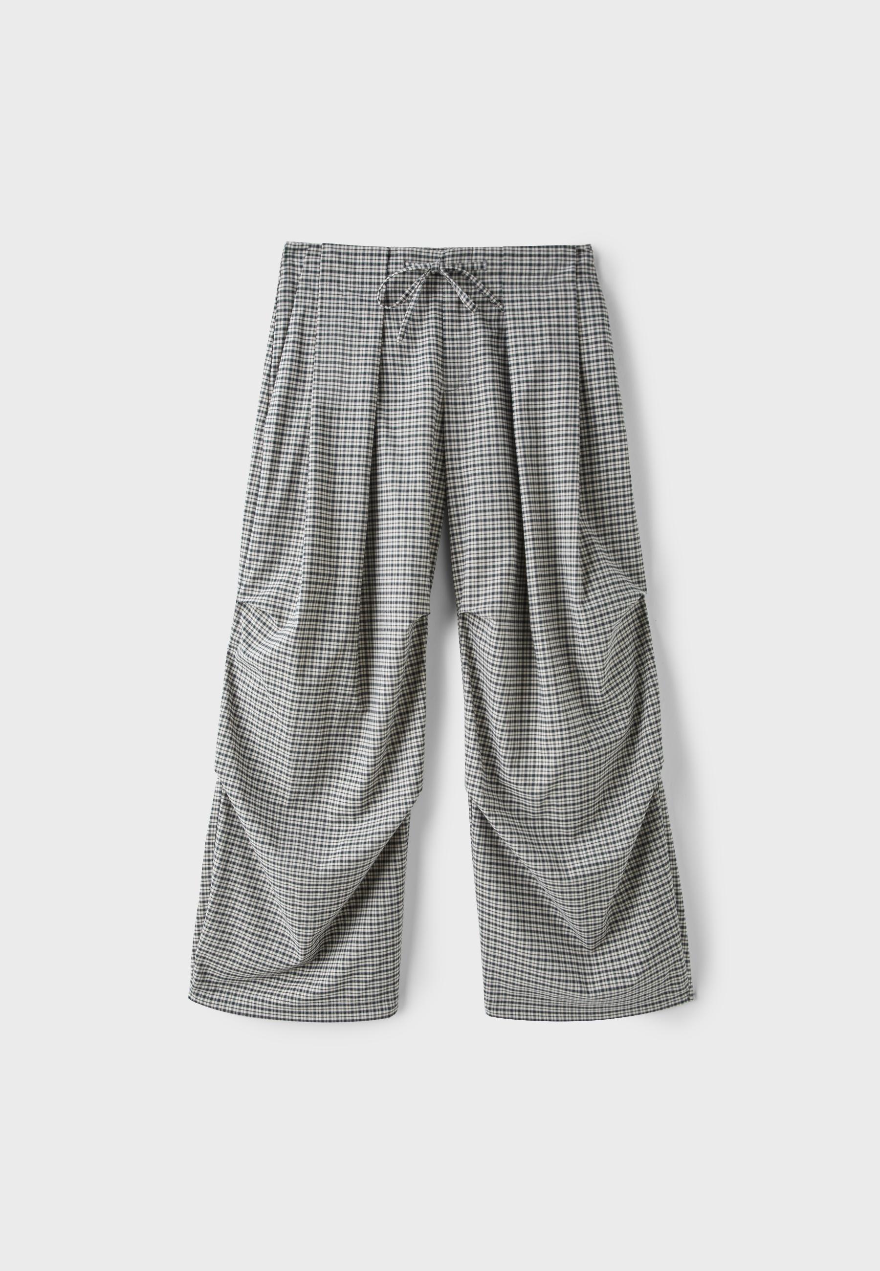 Technical check trousers with pleat detail — Black