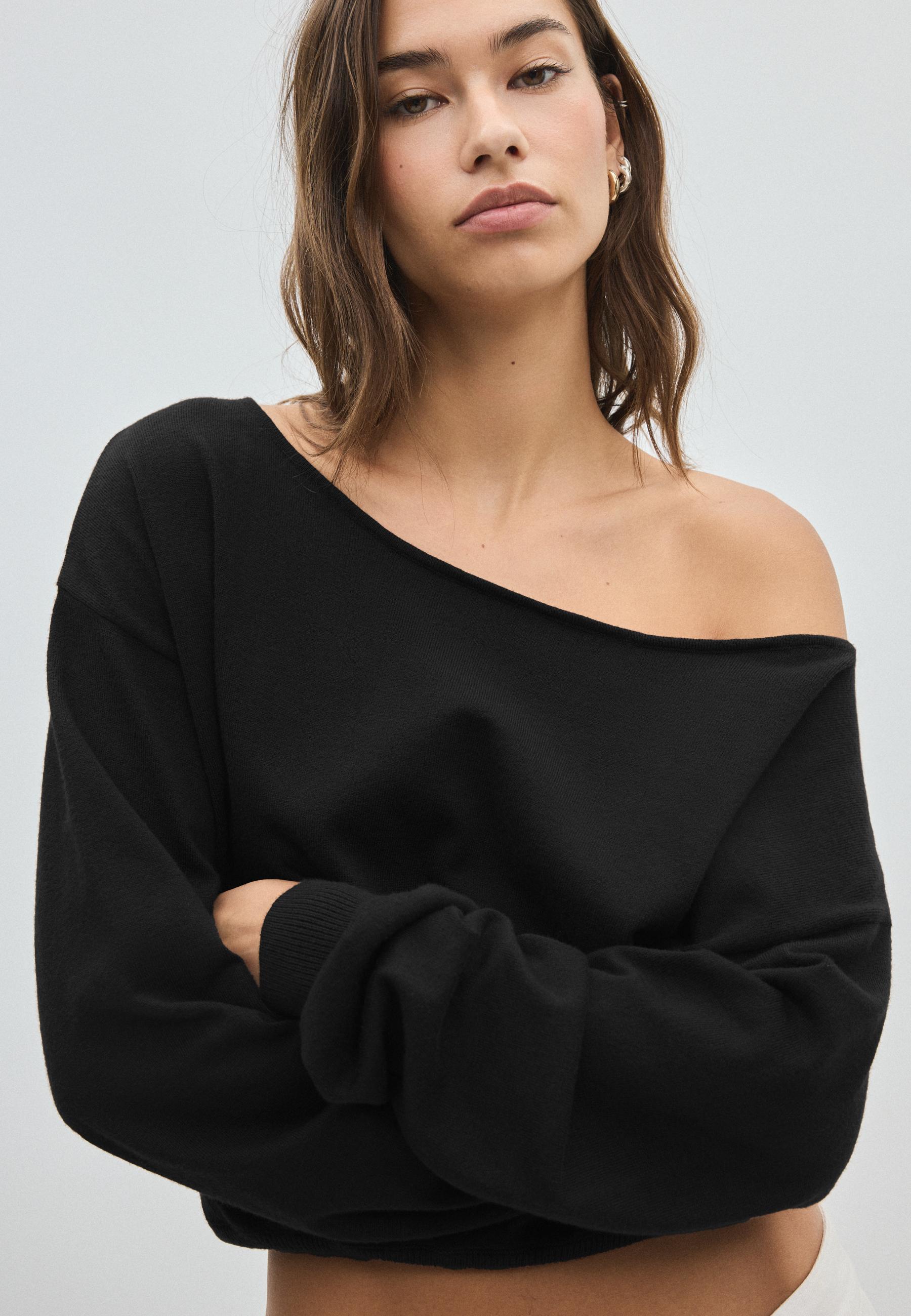 Asymmetric knit sweater — Black