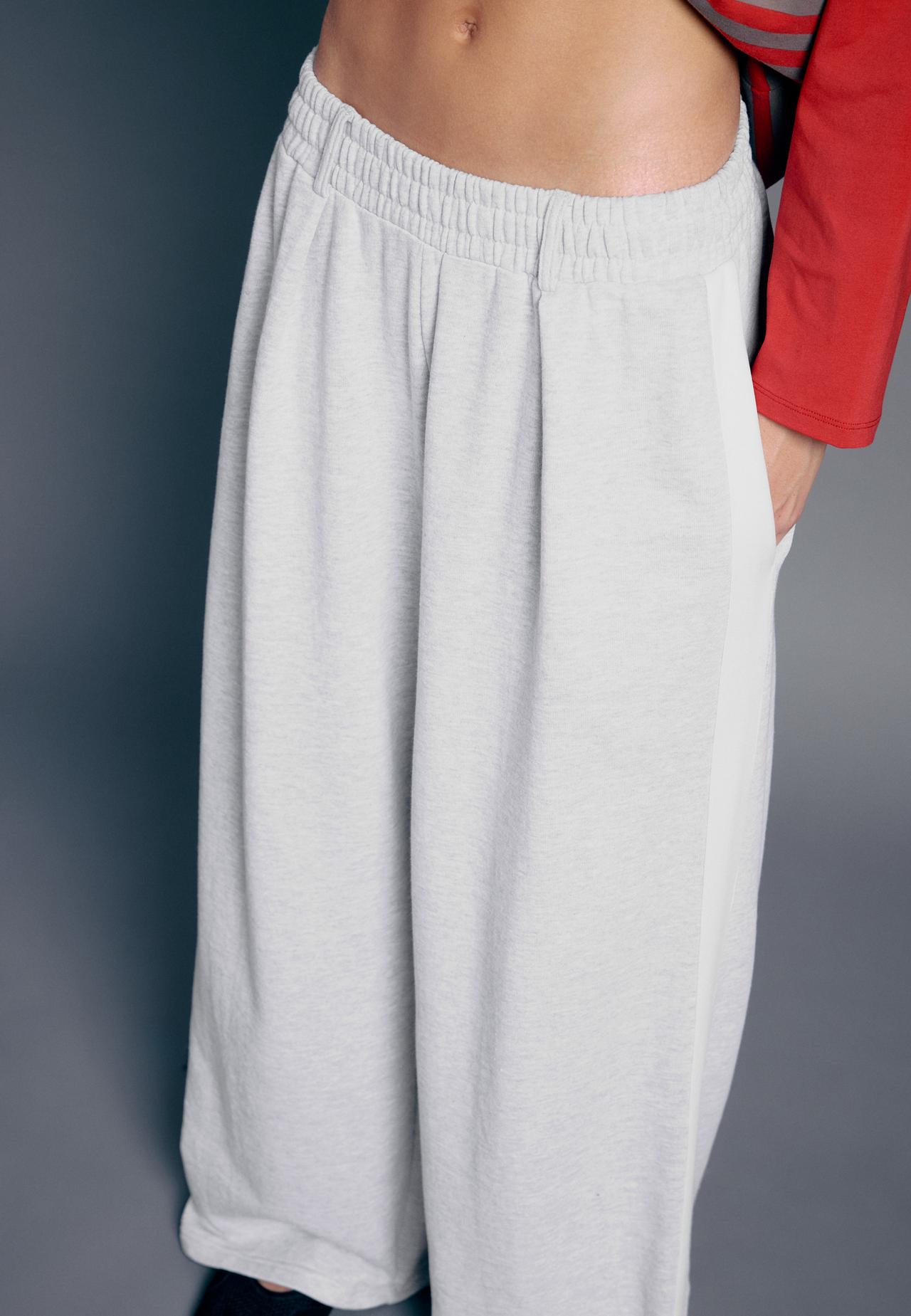 Plush wide-leg trousers with side band — Grey melange