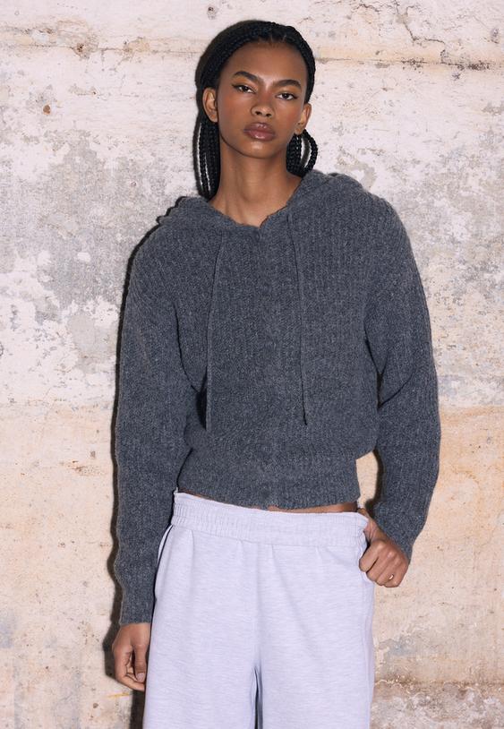 chaqueta de punto botones capucha