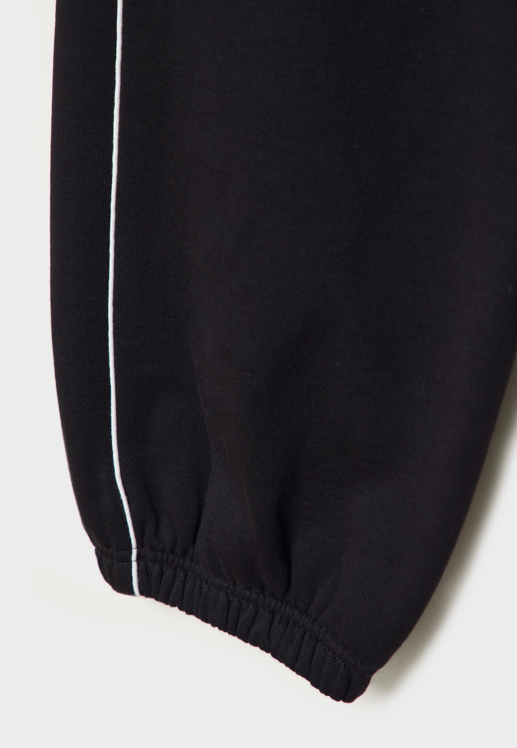 Piping jogger trousers — Black