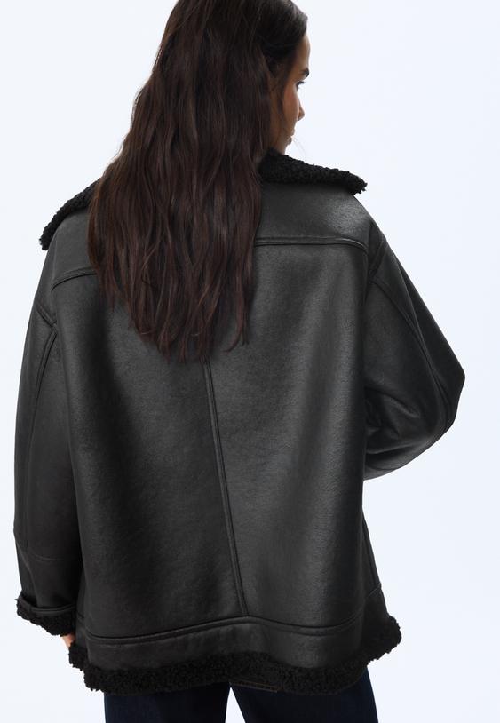 double faced jacket with buckles