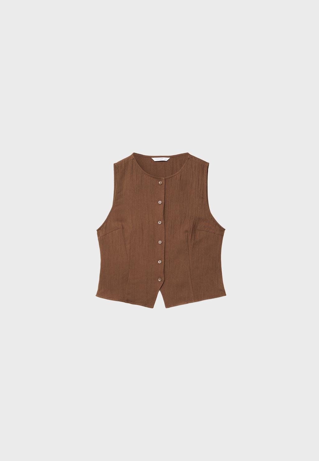 Top texturé à boutons
