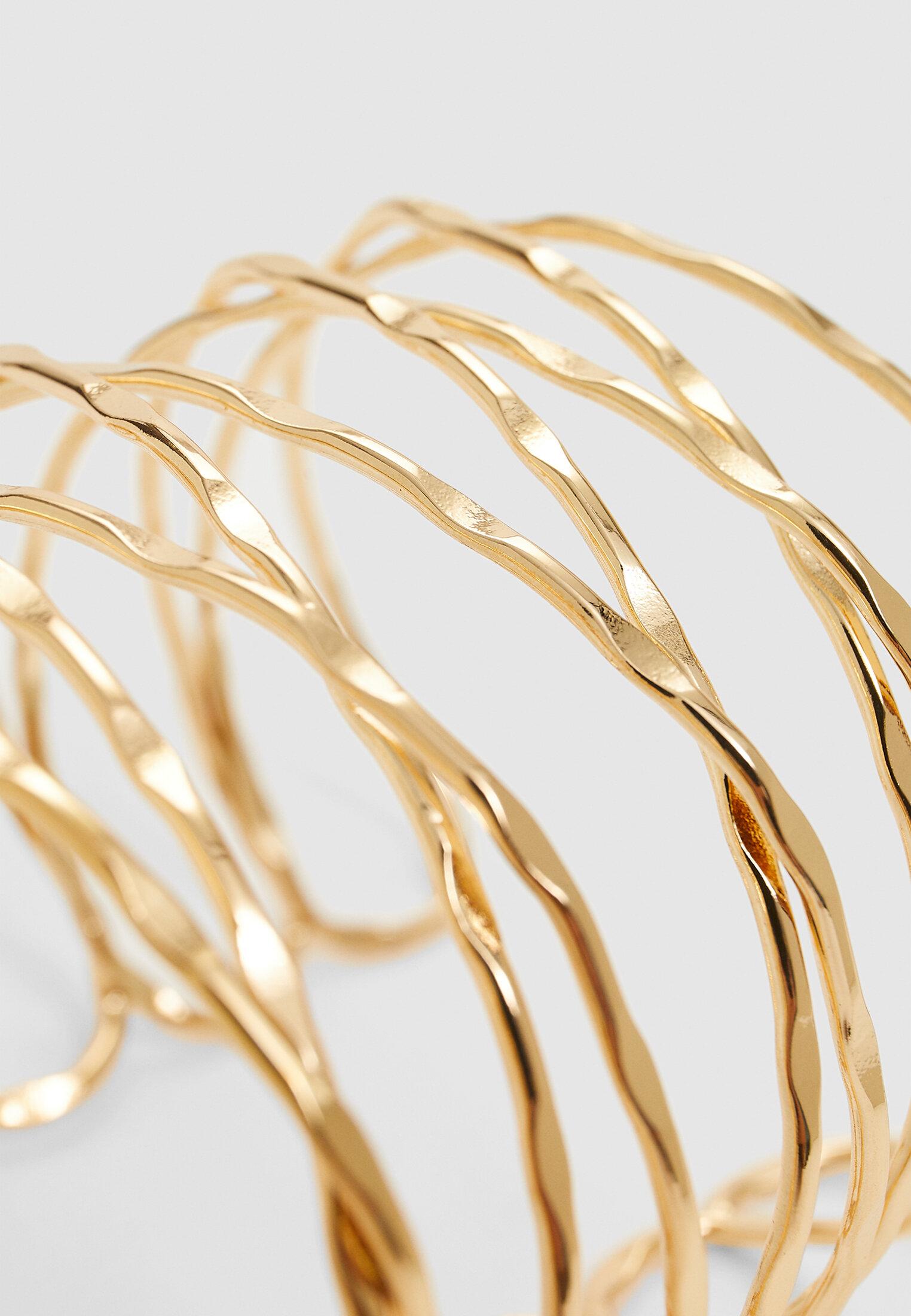 Crossover rigid round arm cuff — Gold