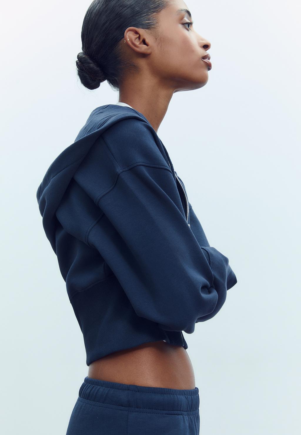 Vetoketjullinen huppari