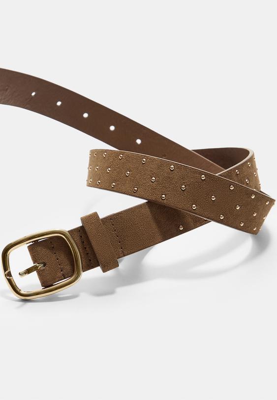 cinturon tachas doradas