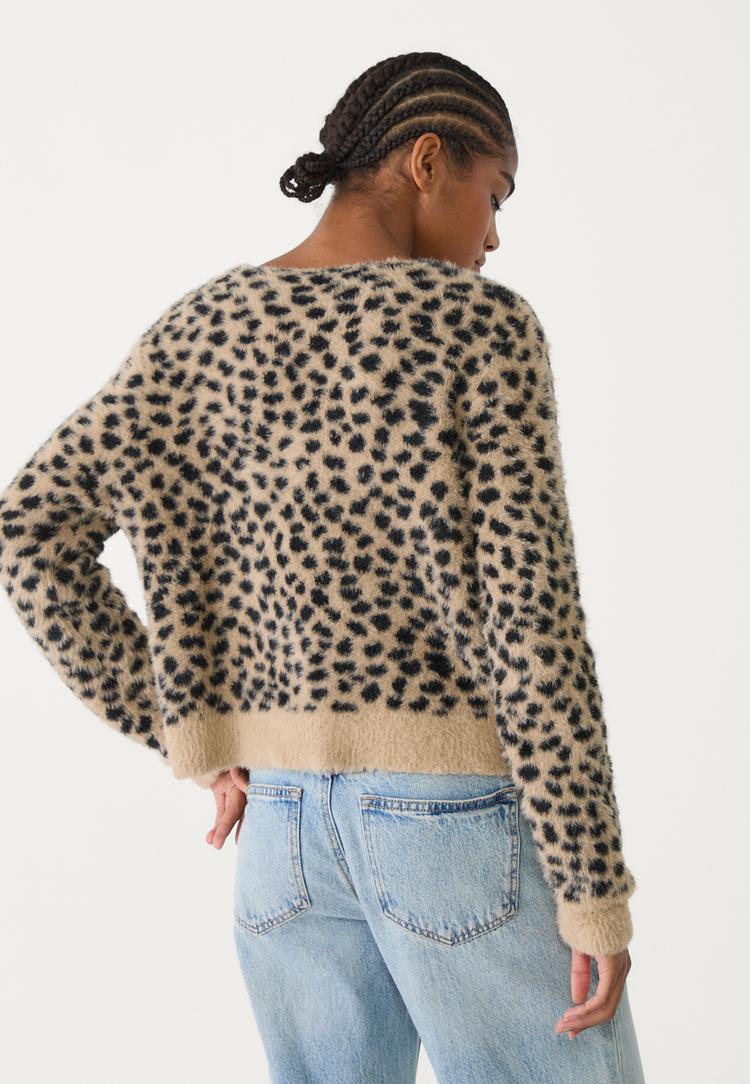 chaqueta punto botones leopardo