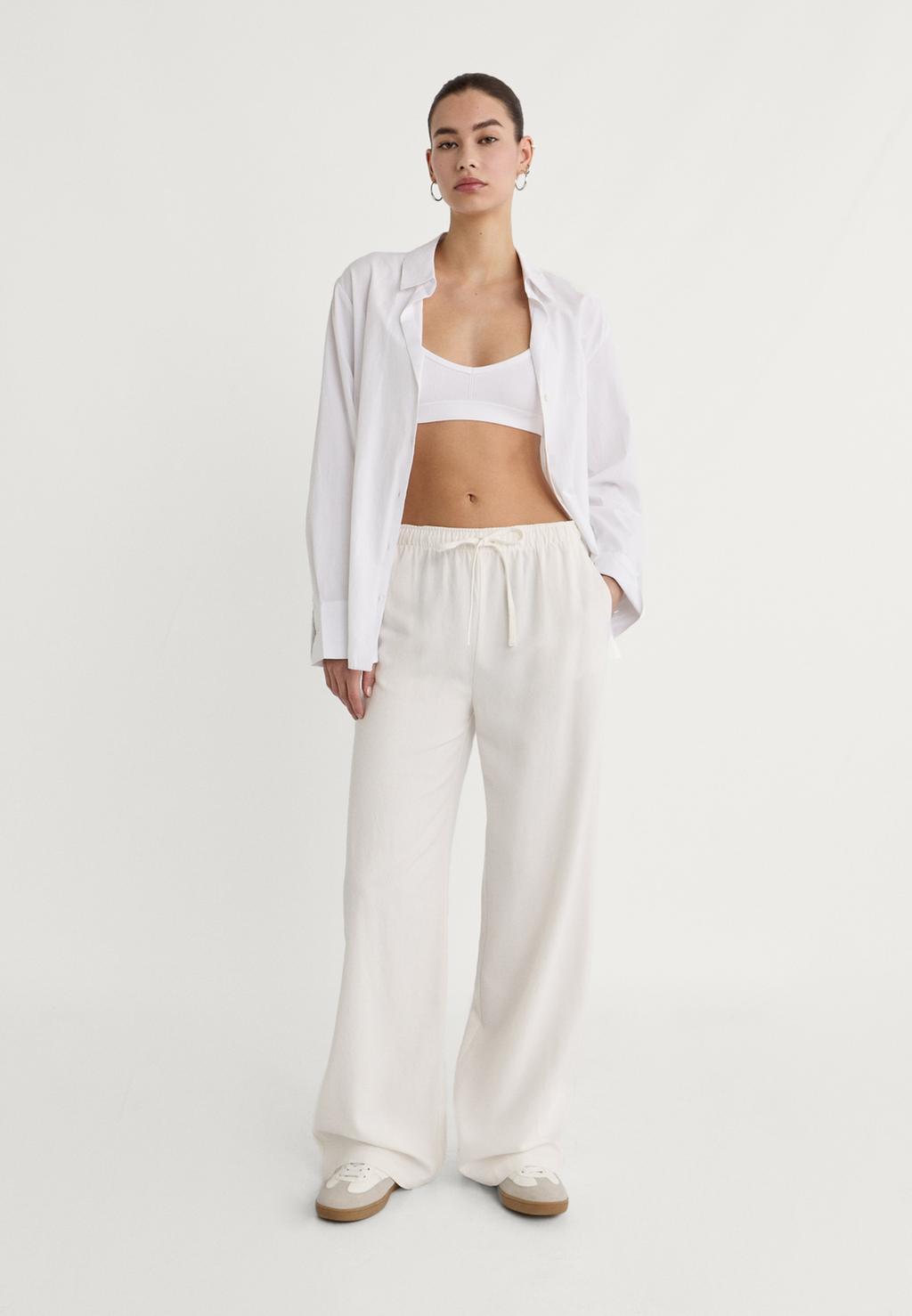 Loose-fitting linen blend trousers